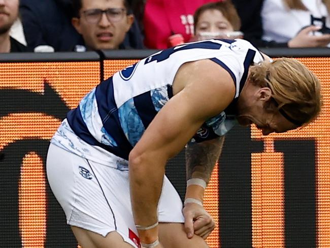 MELBOURNE, AUSTRALIA - APRIL 27: Tom Stewart of the Cats is seen injured during the 2025 AFL Round 07 match between the Carlton Blues and the Geelong Cats at the Melbourne Cricket Ground on April 27, 2025 in Melbourne, Australia. (Photo by Michael Willson/AFL Photos via Getty Images)