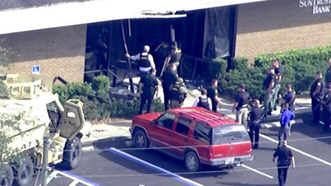 Law enforcement officials responded to an emergency call from a person who claimed to have fired shots inside the building. Picture: AP