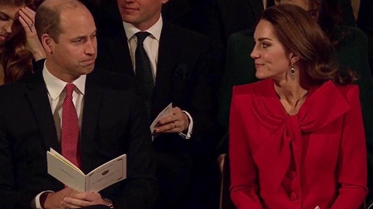 Wills and Kate share a smile as their wedding singer performs. Picture: ITV