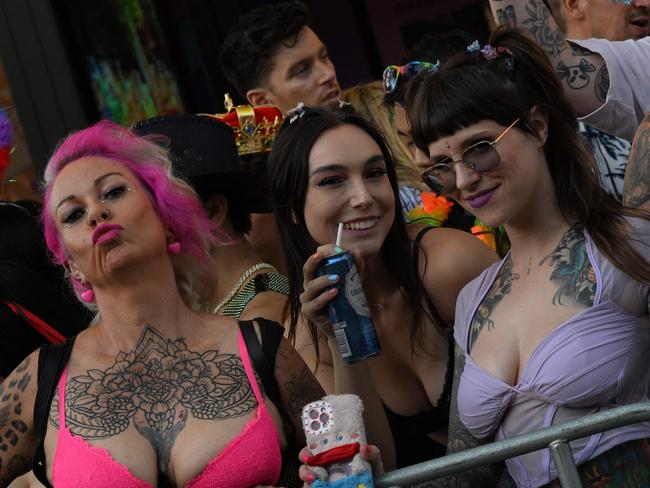 People gather on Oxford Street to watch the 45th Sydney Gay and Lesbian Mardi Gras Parade. Picture: Saeed Khan / AFP