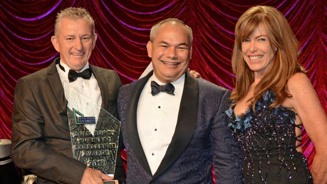 In happier days: Mayor Tom Tate present Condev Constructions boss Steve Marais and Tracy Marais with their business of the year award at the Gold Coast Business Excellence awards just 18 months ago. Photo: Gold Coast Business Excellence Awards