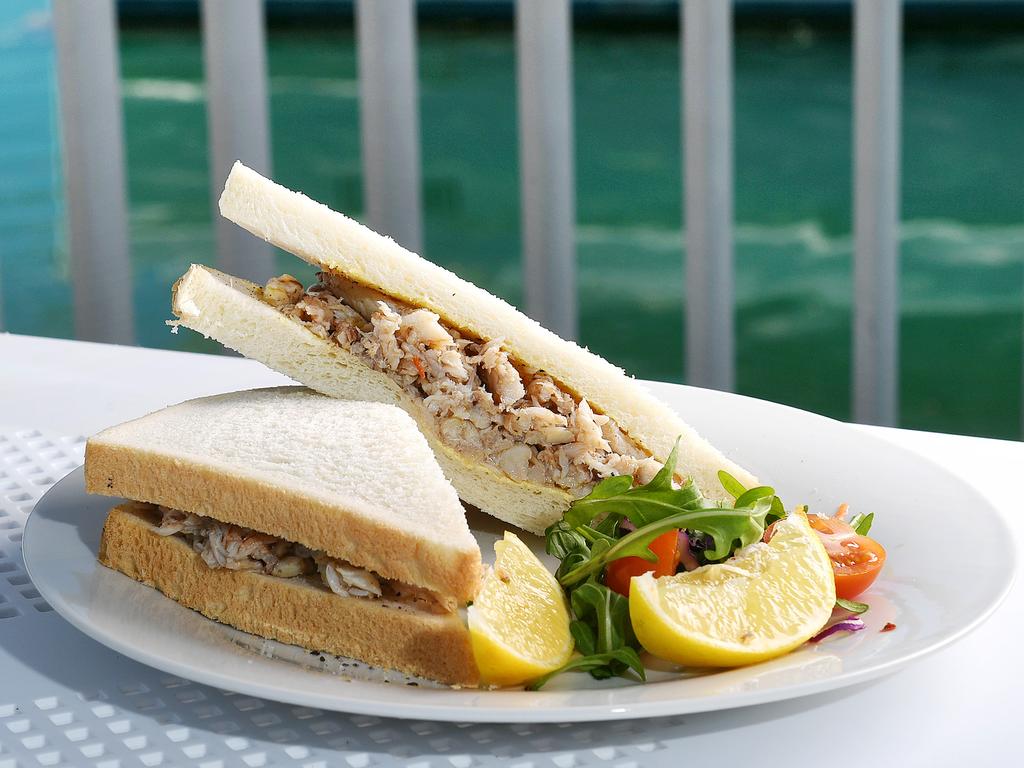 Marina Coffee's specialty, The Crab Sandwich, is becoming iconic. Picture: Shae Beplate.