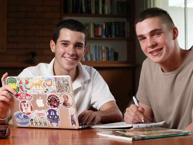 Nudgee College Year 12 students Patrick Kelly, 17, and Michael Jones, 17, studying at home in Aspley. Picture: Liam Kidston