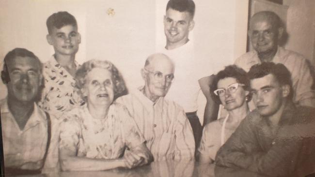 Winston (on the far right) with his family inside the home. Picture: Ben Graham