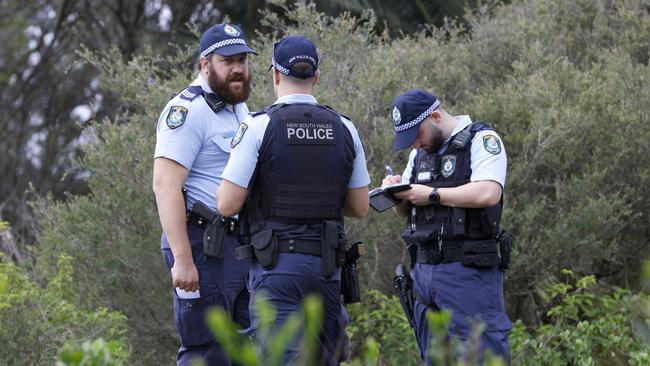 Police at the crime scene on Foreshore Rd in Botany where the body of a woman was found wrapped in plastic. Picture: Damian Shaw