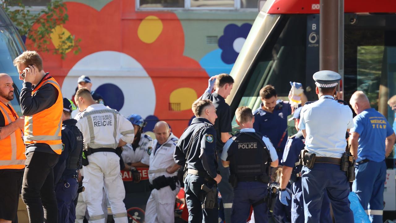 Man dies after becoming trapped under light rail