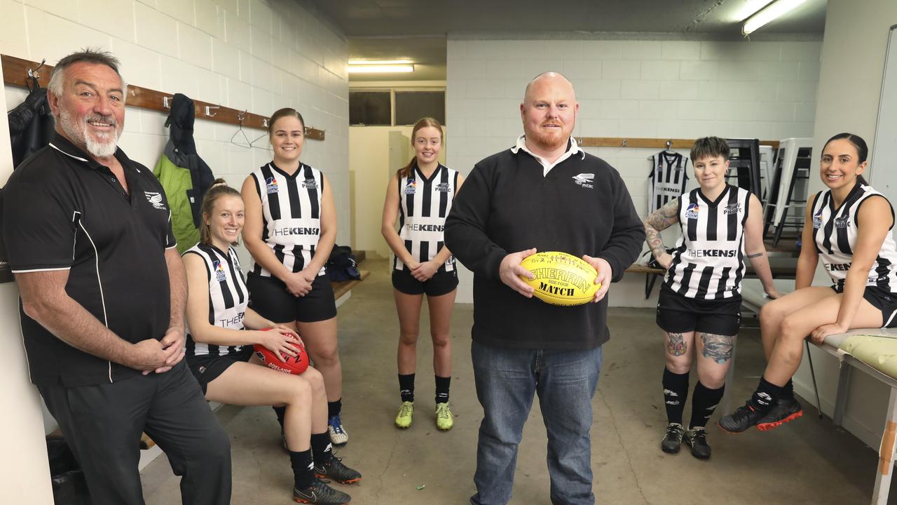 Redlegs great Garry McIntosh (L) is an icon of SA men's footy but is now shifting his focus to the women's game. McIntosh along with senior women's coach Ben Hunt, have played a big part in Payneham Norwood Union's fledgling but successful women's footy program. Players including,(LtoR) Ella Murison, Nichola Venter, Jemma Valente, Emma Cornish, and Sophia Mazzaferro. 5 June 2019. Picture Dean Martin