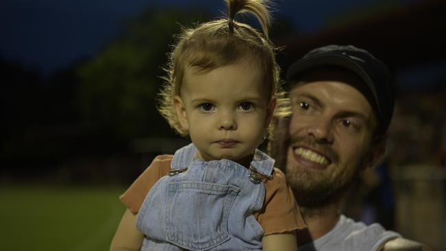 Daisy enjoys the quarter time break playing on the field with here dad during the opening game of the NTFL 22/23 season. Picture: (A)manda Parkinson