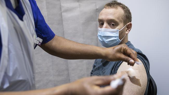 A man receives a Covid-19 vaccine.