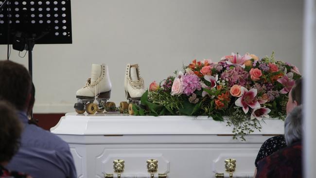 Funeral for Susan Zimmer and Steffanie Zimmer at Mudgeeraba Showgrounds on the Gold Coast. Roller skates on the coffin. Picture Glenn Hampson