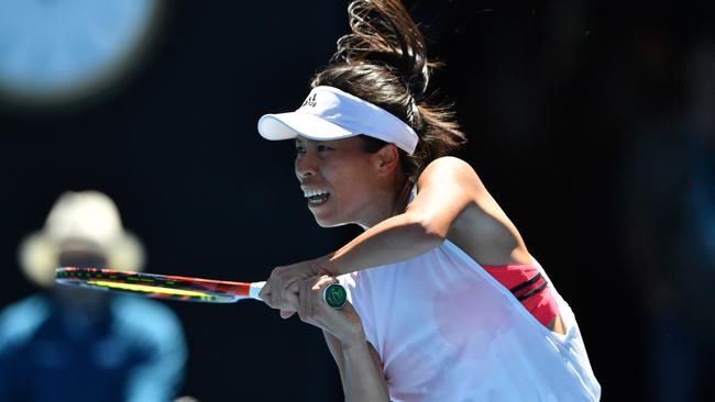 Taiwan's Hsieh Su-Wei hits a return during their women's singles second round match against Spain's Garbine Muguruza on day four of the Australian Open tennis tournament in Melbourne on January 18, 2018. / AFP PHOTO / SAEED KHAN / -- IMAGE RESTRICTED TO EDITORIAL USE — STRICTLY NO COMMERCIAL USE —