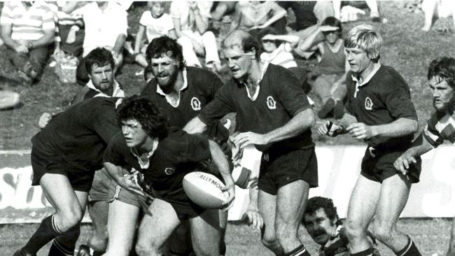 Peter McLean, bearded, playing for Queensland.