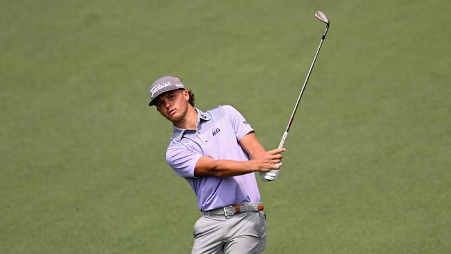 Harrison Crowe, pictured in action during the second round of the Masters, was just 50m away when three towering trees fell at Augusta National Golf Club. Picture: Getty Images