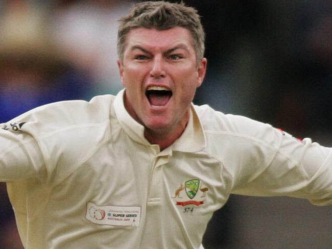 Stuart MacGill celebrates dismissing Sehwag. Super Test cricket. Australia v ICC World XI at the SCG. pic. Phil Hillyard