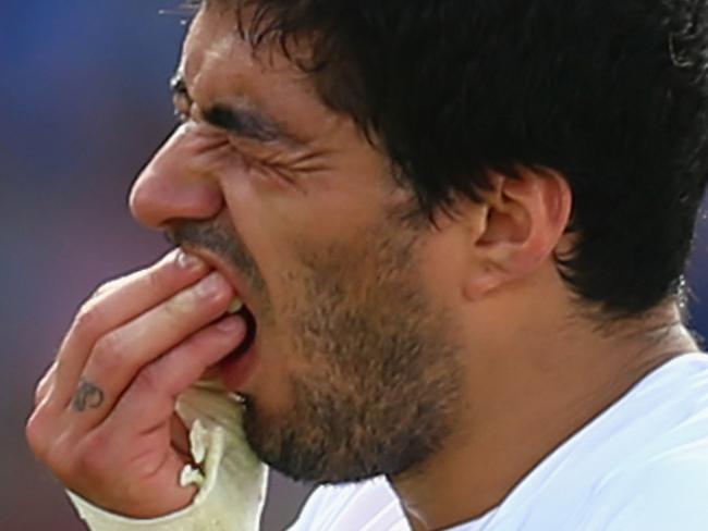 NATAL, BRAZIL - JUNE 24: Luis Suarez of Uruguay reacts during the 2014 FIFA World Cup Brazil Group D match between Italy and Uruguay at Estadio das Dunas on June 24, 2014 in Natal, Brazil. (Photo by Clive Rose/Getty Images)