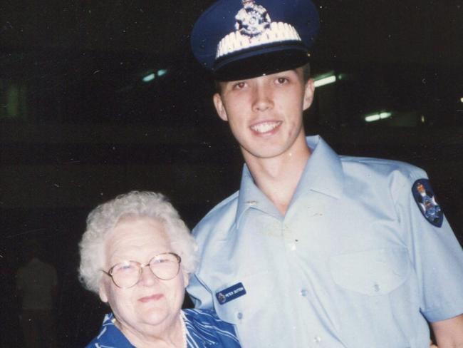 Peter Dutton in his police uniform with his grandmother.