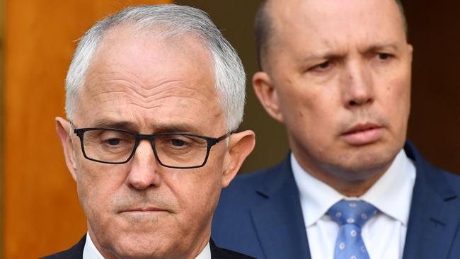 Prime Minister Malcolm Turnbull (left) and Minister for Immigration Peter Dutton (right). Picture: AAP Image/Mick Tsikas