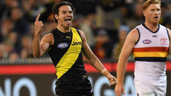 Daniel Rioli celebrates one of his two goals against the Crows.