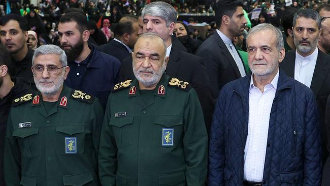 Iranian president Masoud Pezeshkian (R), Head of Iranian revolutionary guard corps Hossein Salami (C) and head of the Iranian Quds forces Ismael Ghaani (L) attend a ceremony in the capital Tehran to commemorate the fifth anniversary of the killing of Revolutionary Guards commander Qasem Soleimani in a US drone strike in Iraq. Picture: AFP.