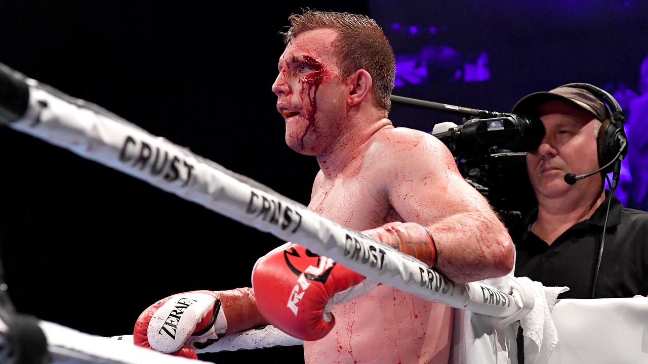 Jeff Horn only had to look down at his gloves to be reminded of his opponent. (Photo by Bradley Kanaris/Getty Images)