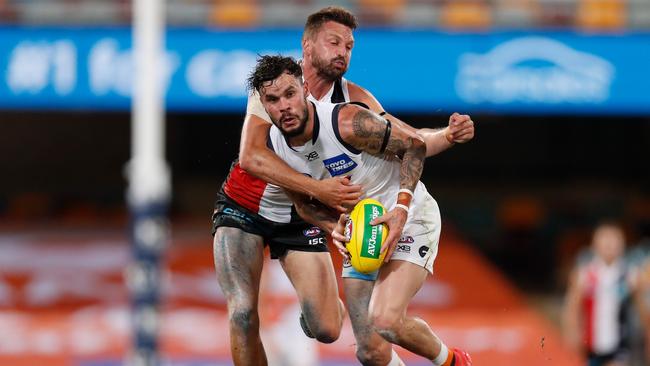 BRISBANE, AUSTRALIA - SEPTEMBER 18: Zac Williams of the Giants is tackled by Jarryn Geary of the Saints during the 2020 AFL Round 18 match between the St Kilda Saints and the GWS Giants at The Gabba on September 18, 2020 in Brisbane, Australia. (Photo by Michael Willson/AFL Photos via Getty Images)