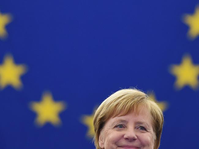 German Chancellor Angela Merkel arrives for a debate on the futur of Europe during a plenary session at the European Parliament in Strasbourg, eastern France, November 13, 2018. - German Chancellor Angela Merkel on November 13 made a clear call for a future European army, in an apparent rebuke to the US president who has called such proposals "very insulting". Addressing European MEPs on her vision for the future of Europe, Merkel also called for a European Security Council that would centralise defence and security policy on the continent. (Photo by FREDERICK FLORIN / AFP)