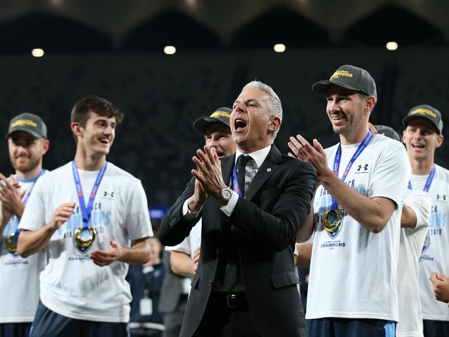 Sydney FC head coach Steve Corica soaks up the big win.