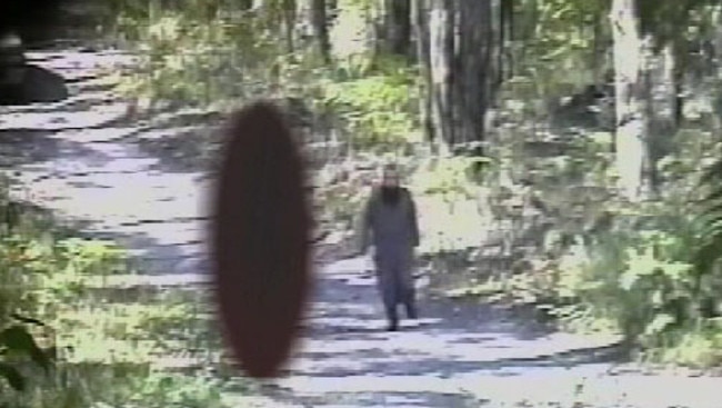 Police surveillance footage of terrorist Abdul Nacer Benbrika running down a hill to check damage after setting off a small test bomb at Mt Disappointment state forest in Victoria.