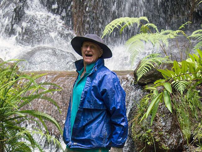 PIC FROM Shay Bourne / Your World My Lens/ Caters News - (PICTURED: Danny Gibsons land that he started re-designing in 2005 in Queensland,Australia. Danny is pictured here standing next to the river he built) - A British nature-lover has forked out 28,000GBP (0,000 AUD) transforming an overgrown forest on his Australian property into a hidden 150-acre paradise fit with a lush waterfall. Danny Gibson, from Middlesbrough in Yorkshire, began work on his enchanted rainforest after retiring to a powerless shed in the tablelands region of Queensland in 2005.SEE CATERS COPY