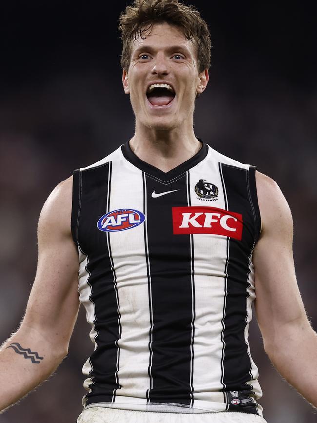 Brody Mihocek celebrates Collingwood’s win over Melbourne.