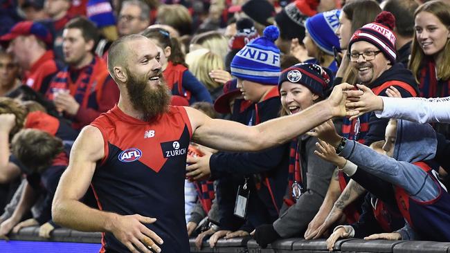 Max Gawn high fives fans after winning earlier this year. Pic: Getty Images