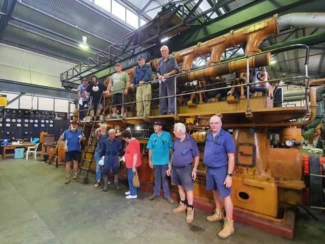 Some of the group working in the Lismore Power Station cleaning it up. The engine is the first one installed when the power station was built in 1932. It is a Davey Paxman model 8VPE. This particular one is the only one of this model built. Picture: Ian Mackie