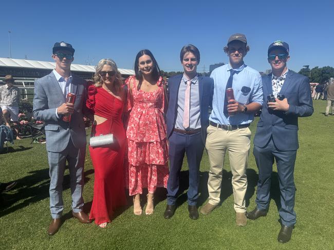 Gus McKee, Savannah Farley, Sophia Lloyd, Brodie Williams, Darcy Jones and Jack Wakman at the Melbourne Cup at Flemington Racecourse on November 5, 2024. Picture: Phillippa Butt