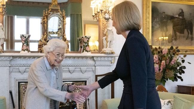 Queen Elizabeth greets Liz Truss as she arrives at Balmoral Castle on Tuesday night (AEST). Picture: Getty Images