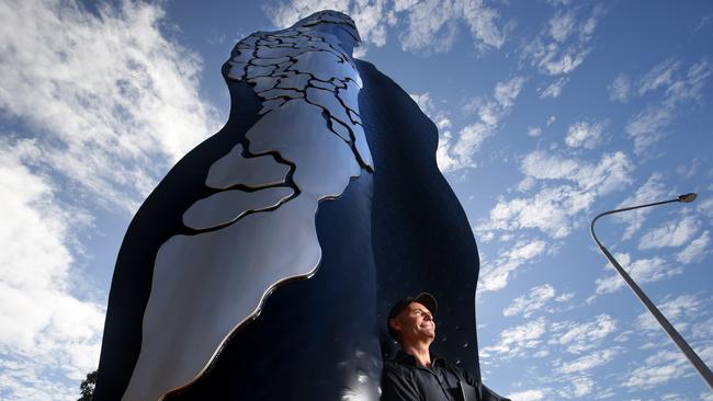 Braham Stevens unveiled his 4.5-tonne steel sculpture entitled Embrace at the entrance to the new Munro Martin Parklands in 2016. Picture: Marc McCormack