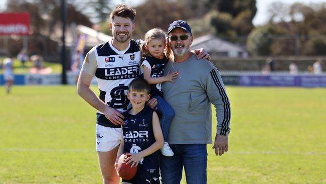 Bryce Gibbs with his dad Ross Gibbs and children Charlie and Madison before his final SANFL game. Ross is a past player with Victor Harbor. Picture: Cory Sutton