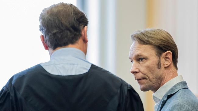 Christian Brueckner speaks to his lawyer in court in Braunschweig, northern Germany, on Tuesday. Picture: AFP