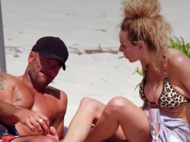 Mike Gunner and Heidi Latcham pictured arguing on the beach. Picture: Supplied by Channel 9