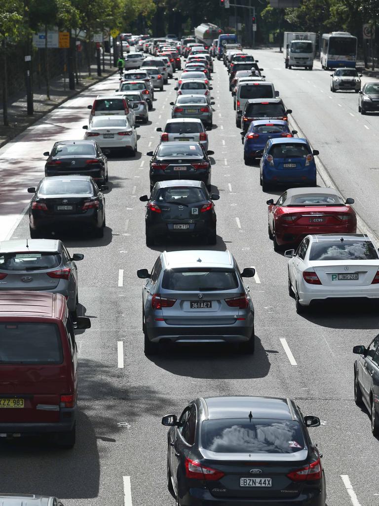 Cars queue along Parramatta road after NSW trains called a snap strike leaving commuters stranded. Picture: John Feder