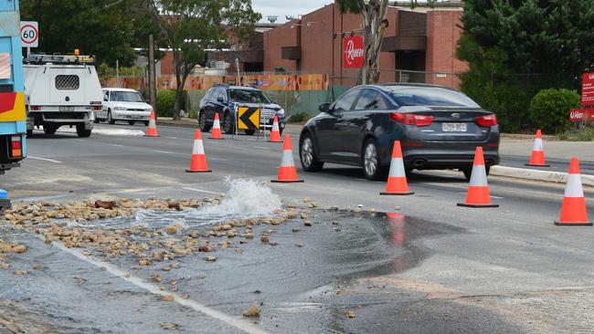 Water flows down Glynburn Rd, Glynde, after another water main burst. Picture: Bianca De Marchi