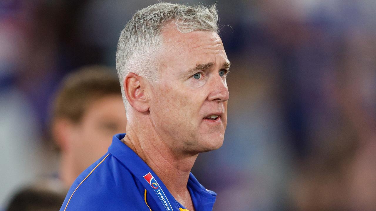 MELBOURNE, AUSTRALIA - MARCH 31: Adam Simpson, Senior Coach of the Eagles addresses his players during the 2024 AFL Round 03 match between the Western Bulldogs and the West Coast Eagles at Marvel Stadium on March 31, 2024 in Melbourne, Australia. (Photo by Dylan Burns/AFL Photos via Getty Images)