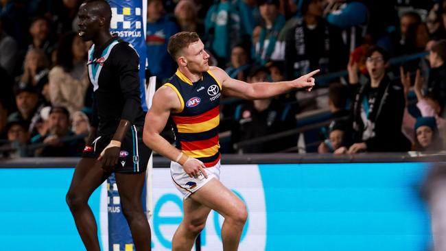 ADELAIDE, AUSTRALIA - AUGUST 20: Rory Laird of the Crows celebrates a goal during the 2022 AFL Round 23 match between the Port Adelaide Power and the Adelaide Crows at Adelaide Oval on August 20, 2022 in Adelaide, Australia. (Photo by James Elsby/AFL Photos via Getty Images)