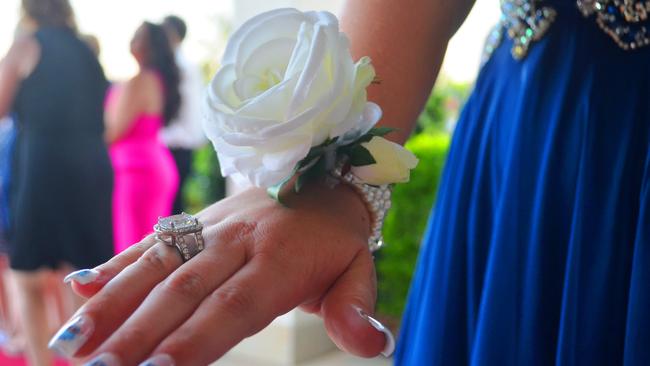 A student displays the beautiful corsage at the Roma State College formal. Photo Tom Gillespie / The Western Star