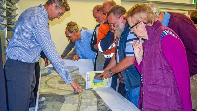 People oberving the plans for the Coffs Harbour bypass at a community drop-in session hosted by the Roads and Maritime Services. Picture: Claudia jambor