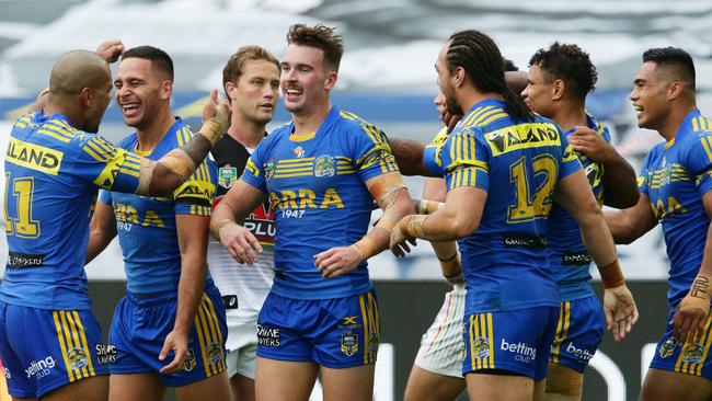 The Eels celebrate a Corey Norman try during the Parramatta Eels v Penrith Panthers NRL round 8 game at ANZ Stadium, Sydney Olympic Park. pic Mark Evans