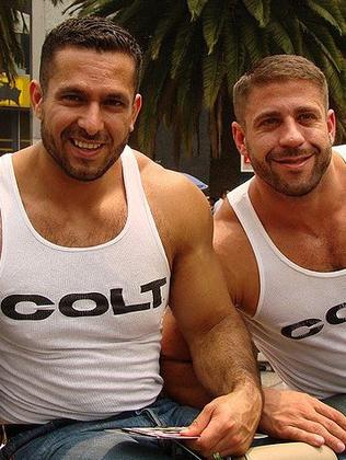 Carlo Masi and boyfriend Adam Champ during their Colt days.  Picture:  Supplied