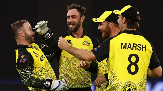 The Australians enjoy a wicket during their win over Sri Lanka.