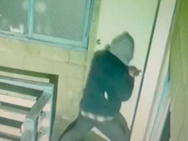 Attempting to break into the bottle shop. Picture: Victoria Police