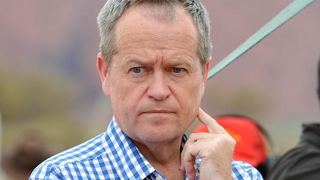 Leader of the Australian Labor Party and Leader of the Opposition Bill Shorten takes in the surroundings during Sunday's 30th Anniversary weekend of the hand back of Uluru.