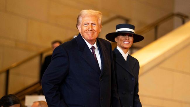 US President Donald Trump, alongside First Lady Melania Trump, arrives to speak in Emancipation Hall during inauguration ceremonies at the US Capitol. Picture: AFP